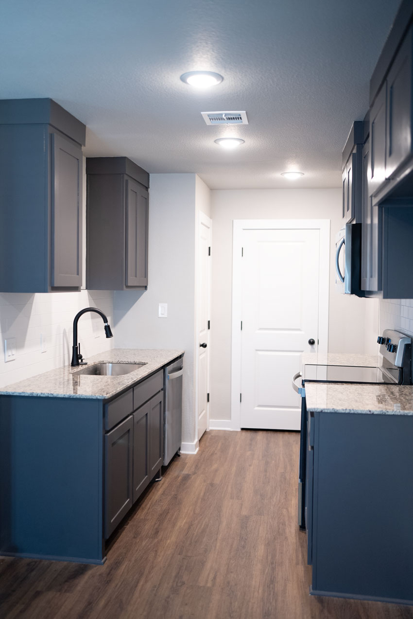 Kitchen in the cottages on Miller Street by Wyldewood homes in Denison Texas