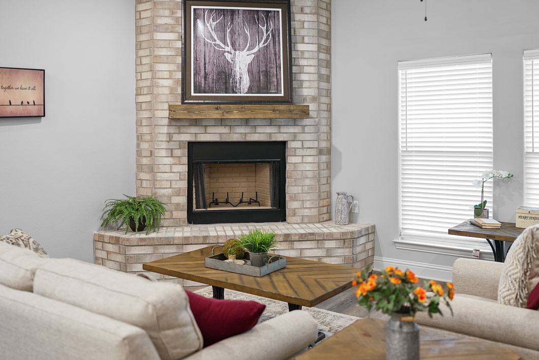 Living room showing floor to ceiling fireplace